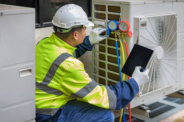 Professional Emergency Ac Repair technician working in Auburn, IL